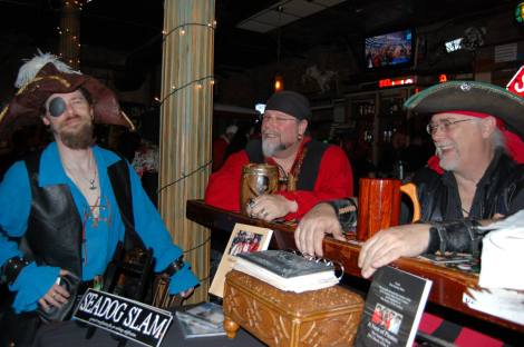 One-eyed poet pirate Lars Shortshanks with Mayhem and Ray Jusrae of The Seadog Slam crew